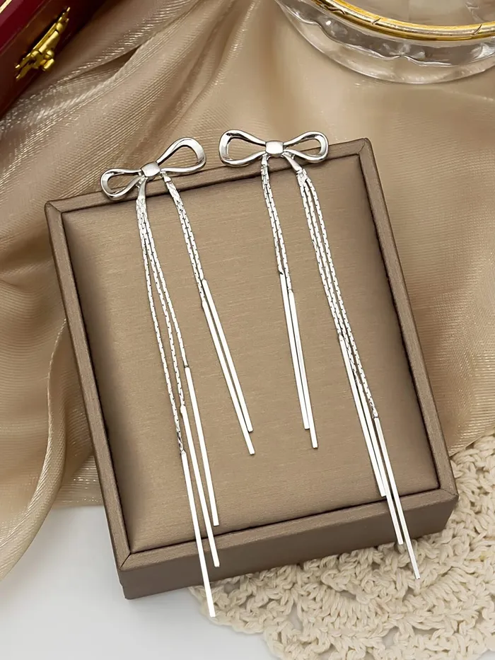 Yellow Chimes Yellow Chimes Earrings For Women Silver Toned Bow Shaped Chain Hanging Dangler Earrings For Women and Girls Earrings
